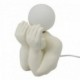 Lampe veilleuse Personnage en porcelaine, tête en sphère lumineuse entre les mains, hauteur 25 cm